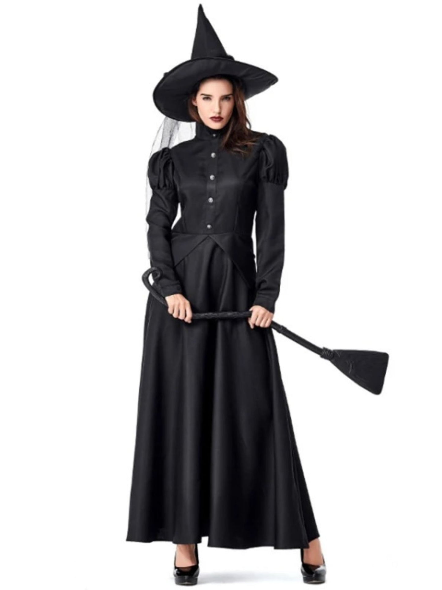 Seitenansicht der Hexe mit Besen, dunkles Outfit im Profil